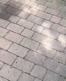 Before image of block paving soiled and dirt also an after image of it professionally cleaned.