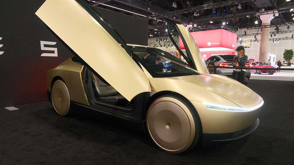 gold autonomous car with doors up on a show floor, landscape, focus on car