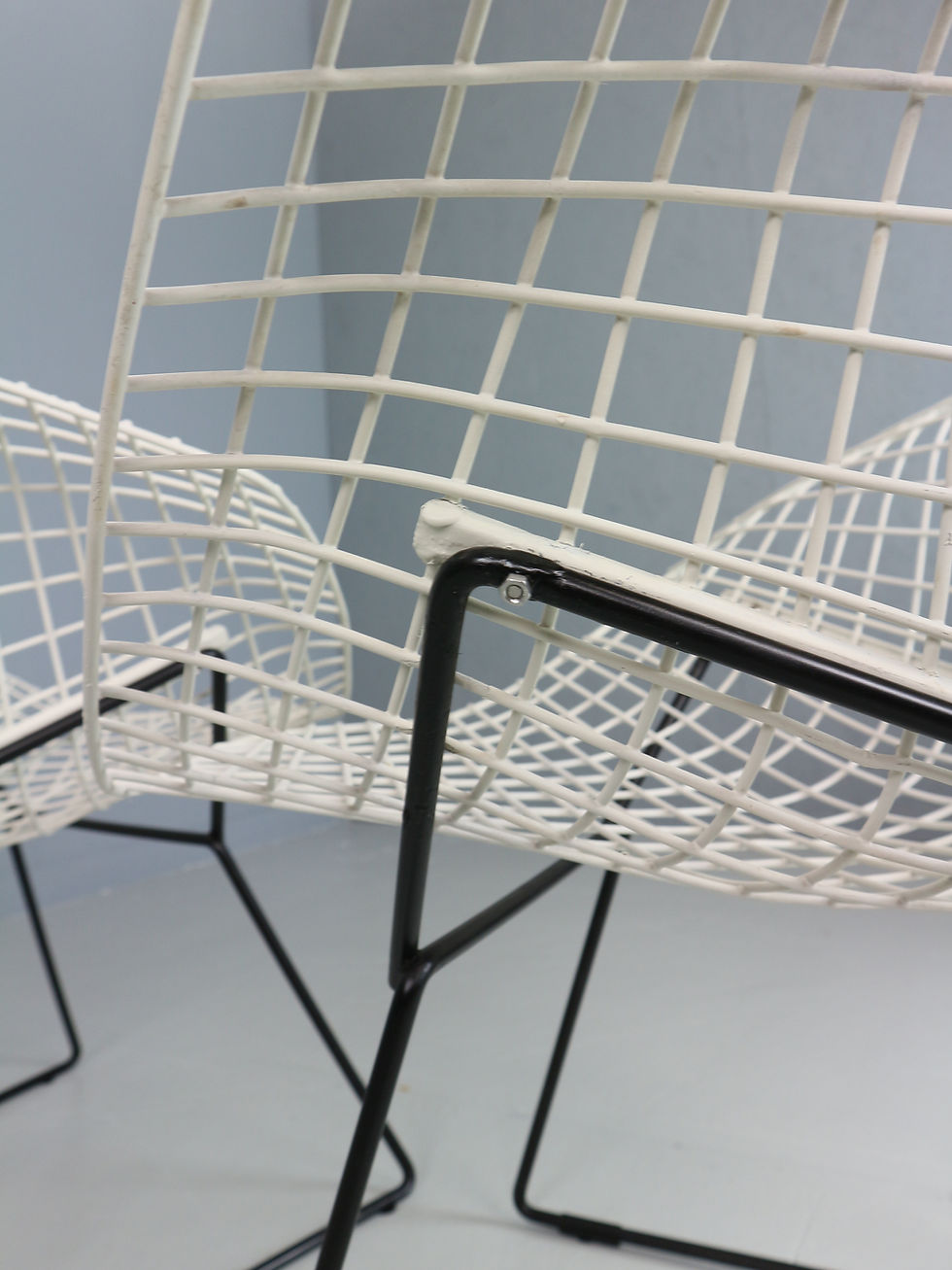 Thumbnail: Set of two Diamond chair by Harry Bertoia in white & black metal. 1960s