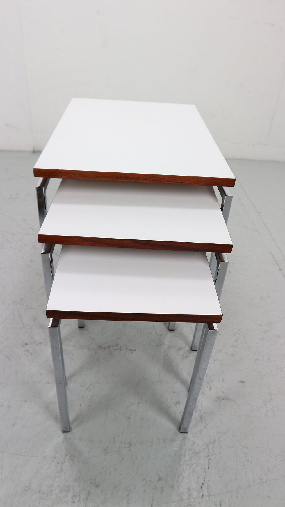 Thumbnail: White Nesting Table Set with chrome frame and wood detail, 1970s