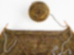 Place sleeve stitches on waste yarn.