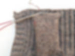 ... and close the bottom with three-needle bind-off.