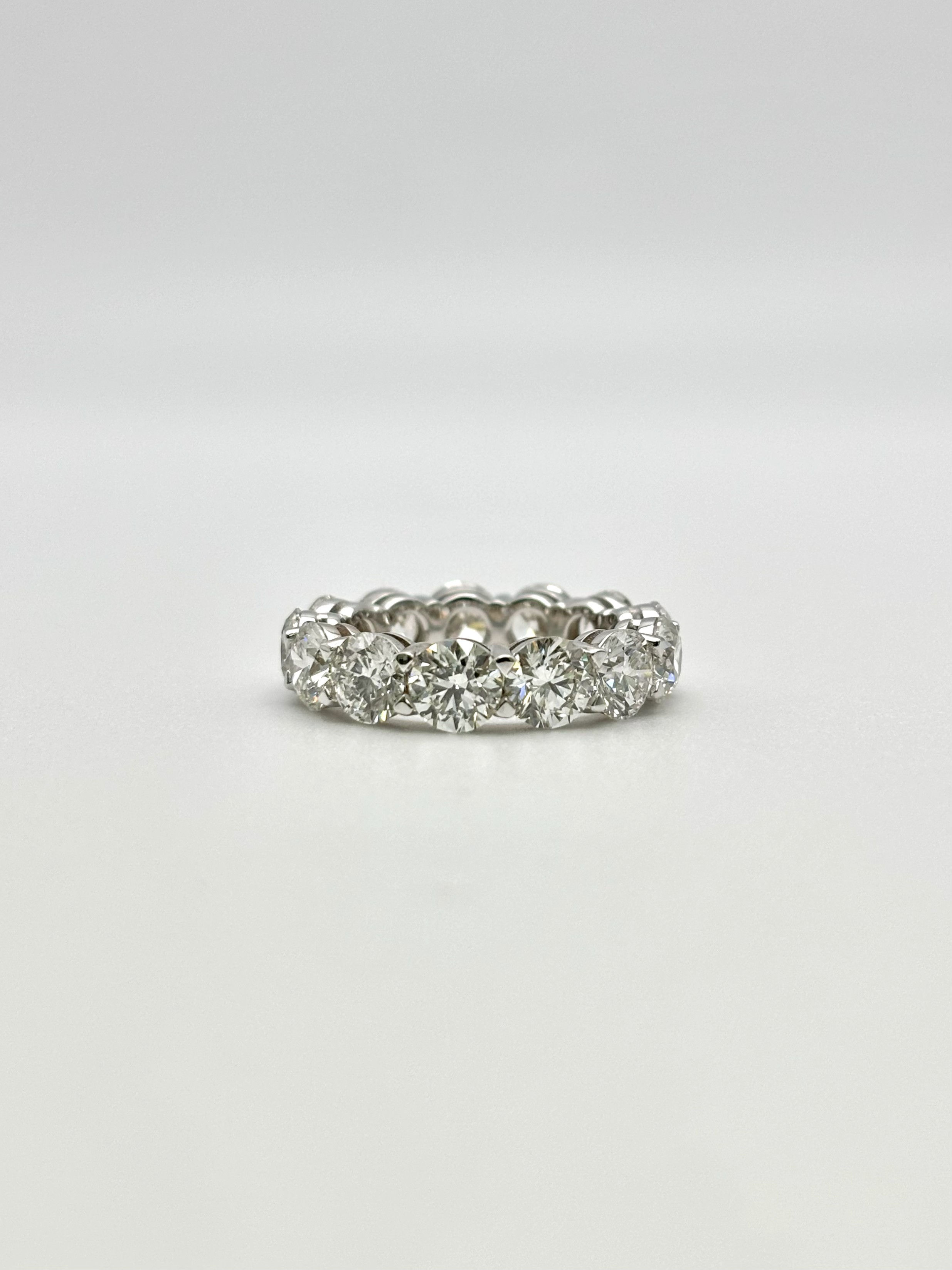 Elegant 18k white gold eternity band featuring GIA-certified round brilliant diamonds