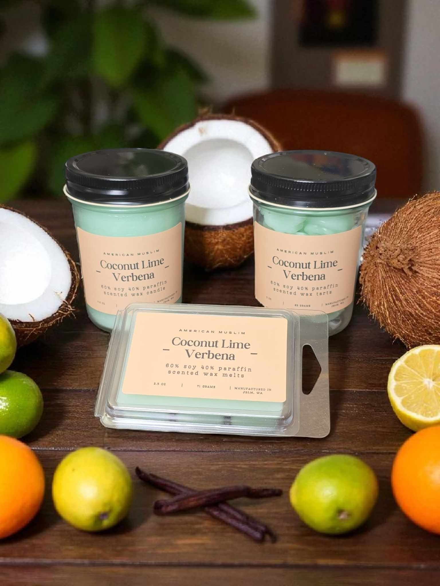 Front view of wax products surrounded by coconuts, and citrus fruits.