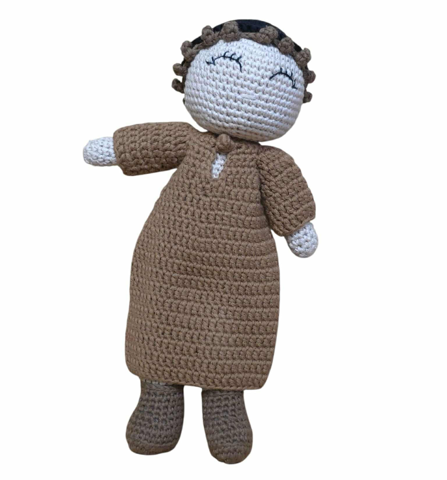 Front view of Muslim male doll.