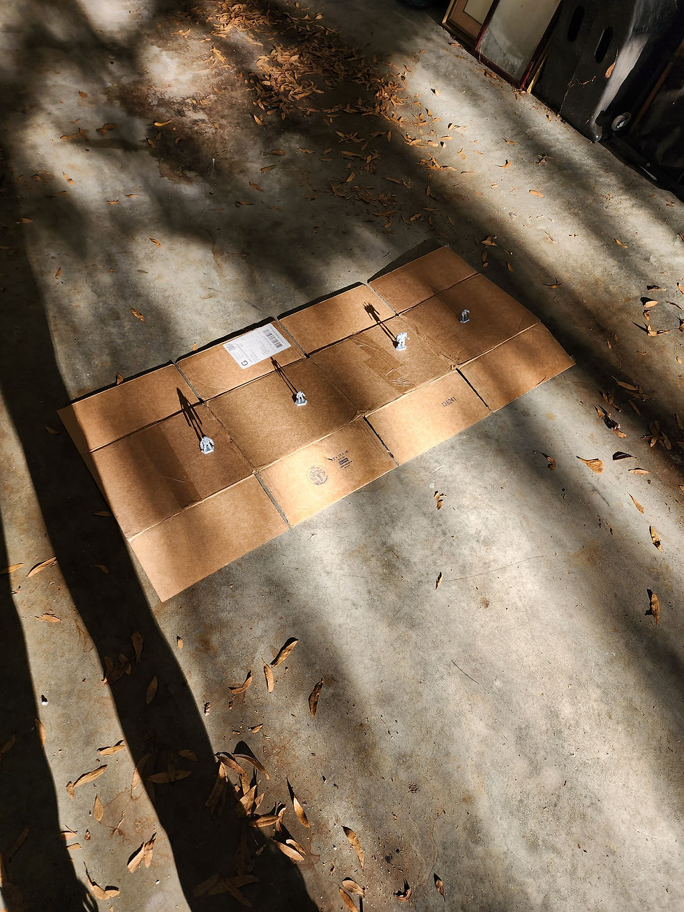 Priming Battletech miniatures in my garaggge