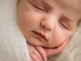 WHY is there a baby in our bed?