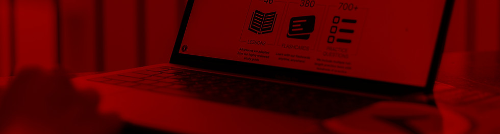 person using macbook pro on brown wooden