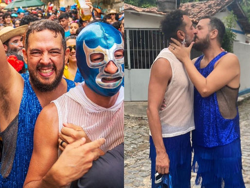 Irandhir Santos całuje męża podczas przedkarnawałowych obchodów w Olindzie.