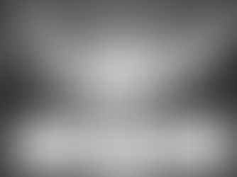 The Newcastle United and Barcelona squads standing in a line for the Champions League anthem at St. James' Park. The floodlights are at full power and the crowd is a sea of black and white, capturing the anticipation of a knockout night on Tyneside | NUFC Blog