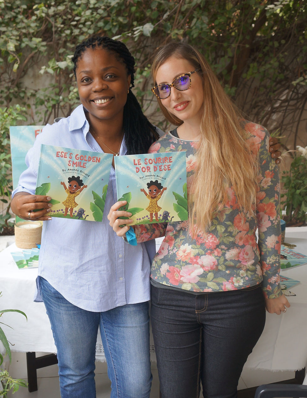 Book launch, here is a photo of me and Claire who got a copy of the French version of Ese's golden smile "Le Sourire D'Or d'Ese."