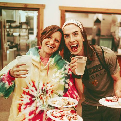 Mother and daughter eat dinner at a memorial day family retreat at seneca hills north or Pittsburgh