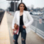 blogger Sarah Lindner of The House of Sequins wearing Express Olivia Culpo Side Cut-Out Thong Body Suit, Express Olivia Culpo Striped Boyfriend Blazer, express Striped Strap Half Moon Crossbody Bag, and express High Waisted Ripped Denim Perfect Ankle Leggings