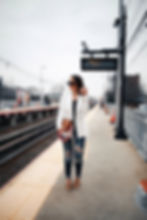 blogger Sarah Lindner of The House of Sequins wearing Express Olivia Culpo Side Cut-Out Thong Body Suit, Express Olivia Culpo Striped Boyfriend Blazer, express Striped Strap Half Moon Crossbody Bag, and express High Waisted Ripped Denim Perfect Ankle Leggings