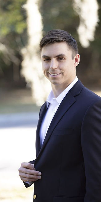 Smailing outdoors suit Insta profile pic.jpeg