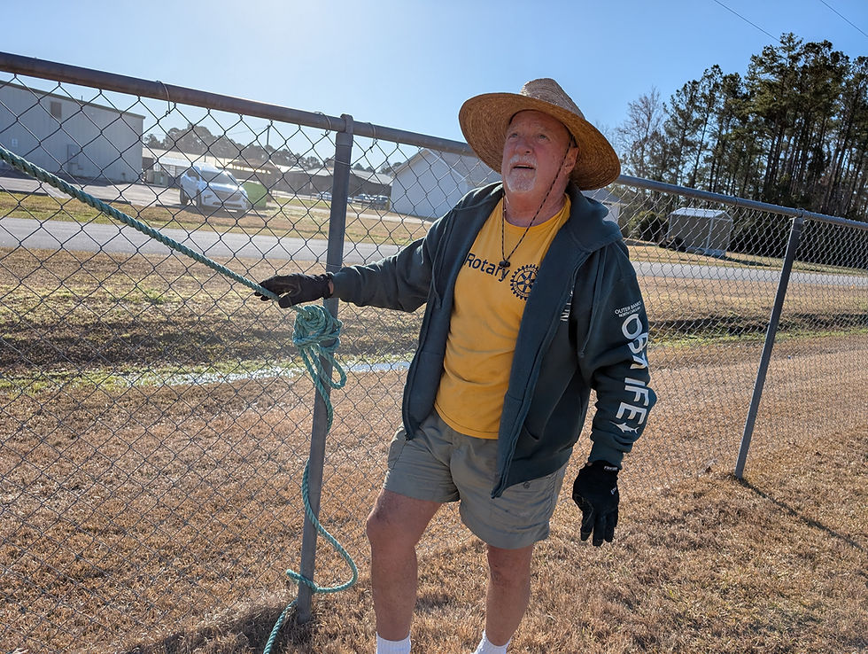 Fixing tarp at Heartworks