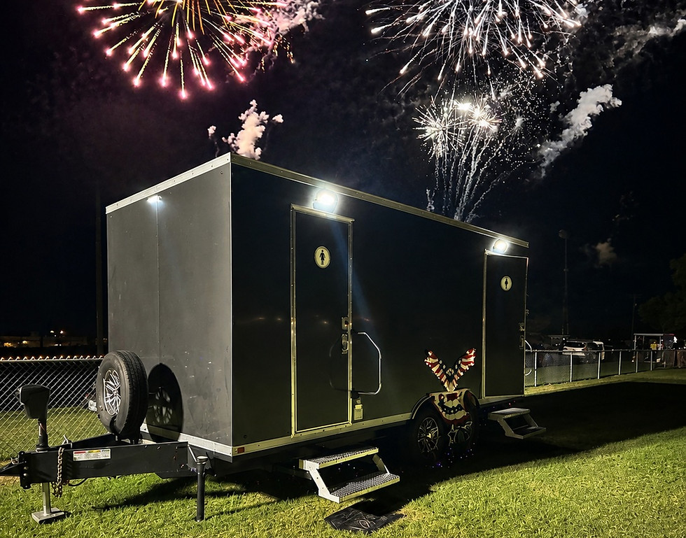 Luxury restroom trailer rental in Central Texas with fireworks.