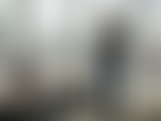 Man in tech-powered menswear adjusting blazer cuff