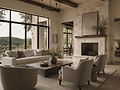 Modern living room with stone fireplace and large windows