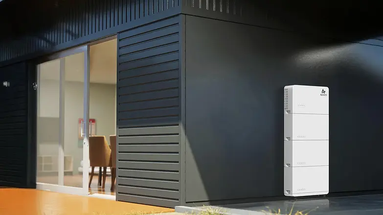 A solar battery system attached to the wall of a home