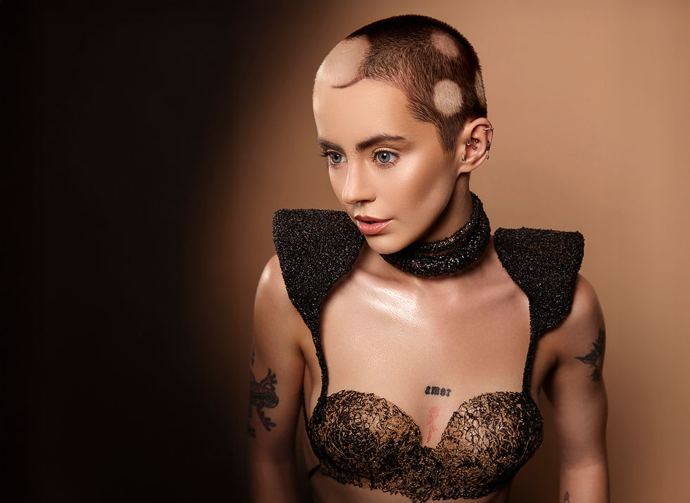 buzz cur hair model with bleached spots