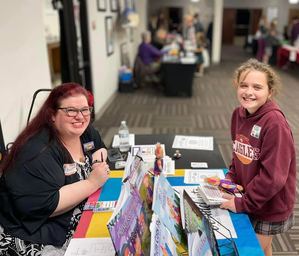Children's author Cindi Handley Goodeaux with a young fan.