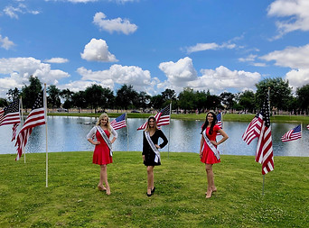 titleholders with flags.jpg