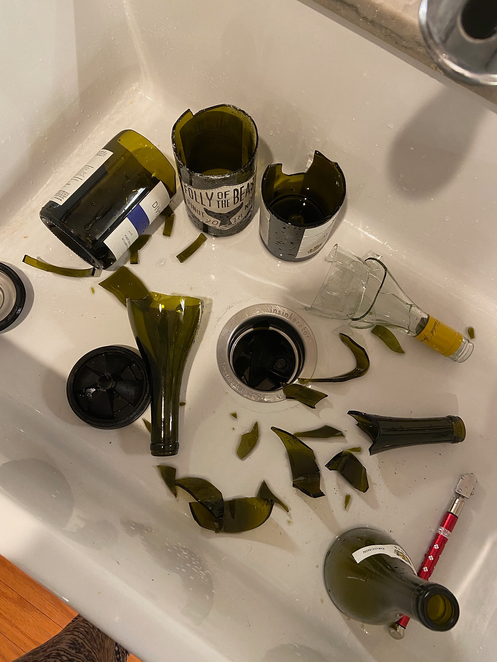 Broken glass from not properly cutting the wine bottle right