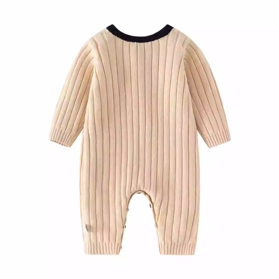 Thumbnail: Baby's white ribbed knitted jumpsuit