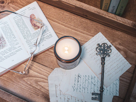 Larkwood Lodge candle in a cosy lodge-inspired setting with warm lighting, rustic wood and autumn tones