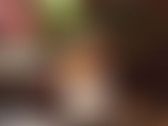 Ancient Woodland soy candle being lit in a styled setting, demonstrating how to burn soy wax candles properly