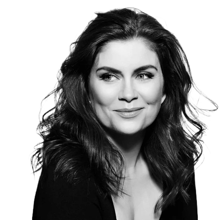 Smiling woman with long hair, black and white portrait, looking forward.