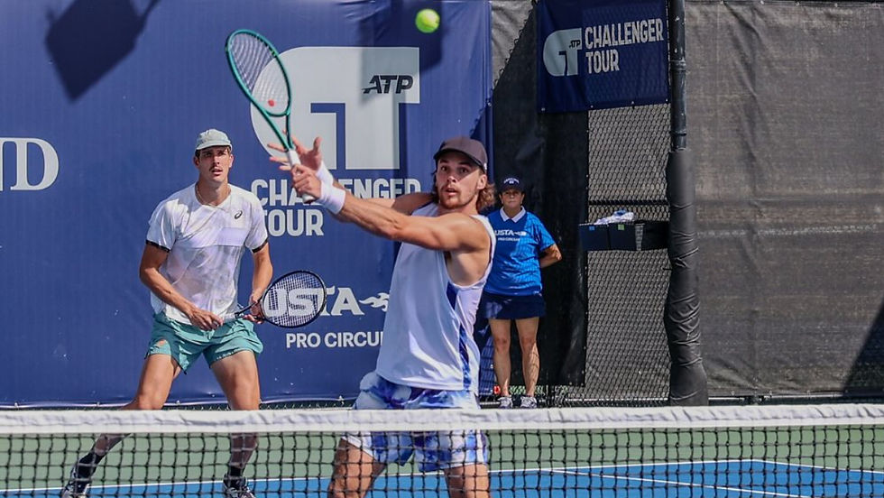 Finn Reynolds about to hit a volley with James Watt in the background at th Tiburon Challenger for their fourth title of the year PHOTO: TIBURON CHALLENGER