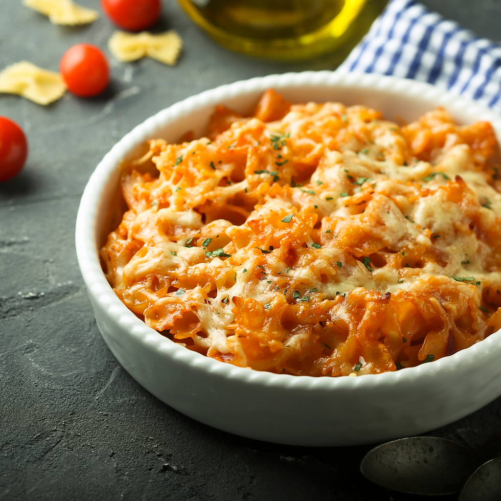 Creamy vegan pumpkin pasta topped with fresh parsley and vegan parmesan.