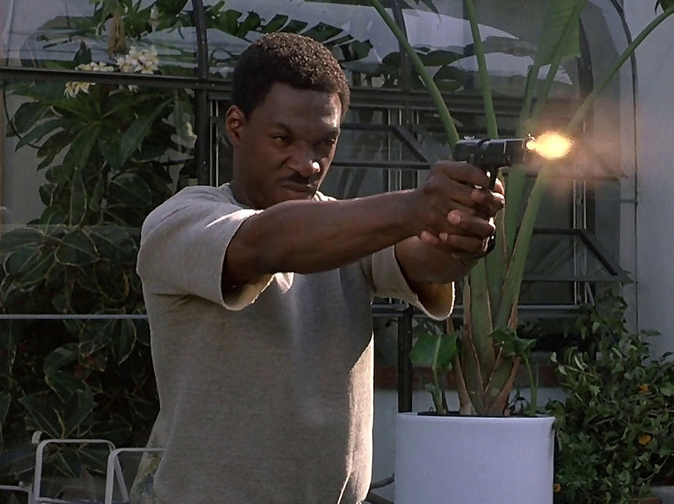 Eddie firing gun