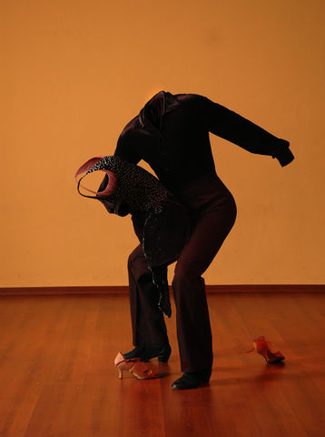 An invisible man dancing with an invisible woman.