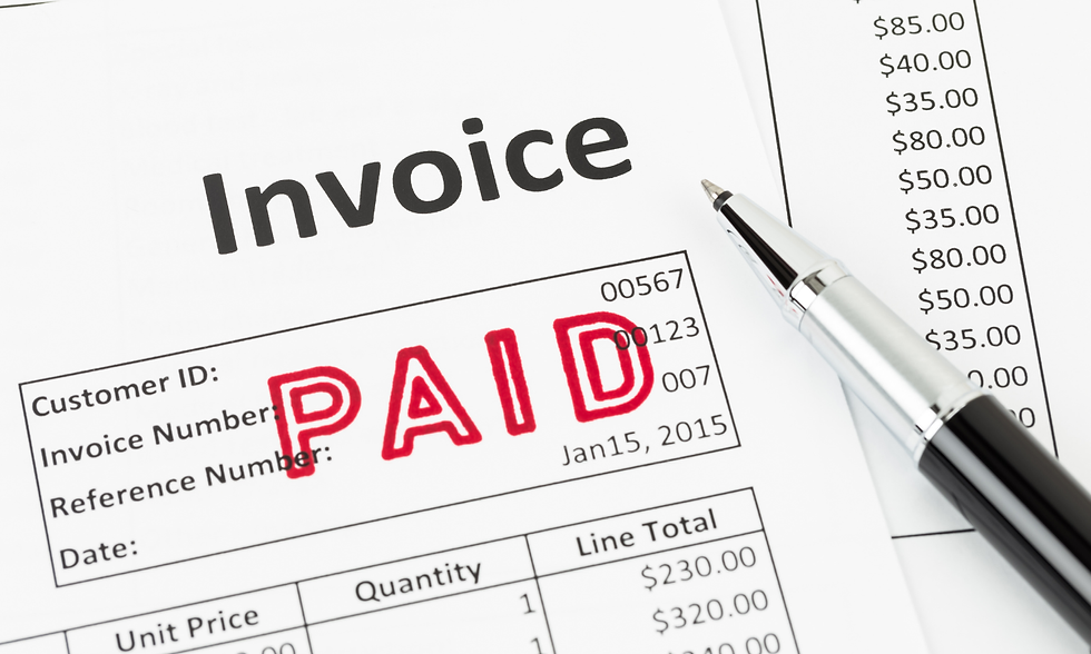 Invoice with "PAID" stamped in red. Black pen on the document. Itemized list and totals. Date: Jan 15, 2015. White background.