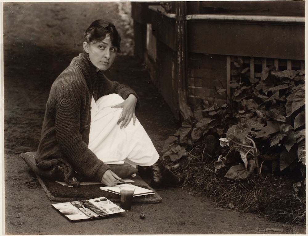 Alfred Stieglitz, Georgia O'Keeffe with watercolor paint box, 1918. Gelatin silver print on paper. George Eastman Museum, purchase and gift of Georgia O'Keeffe, Courtesy George Eastman Museum.