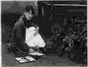 Alfred Stieglitz, Georgia O'Keeffe with watercolor paint box, 1918. Gelatin silver print on paper. George Eastman Museum, purchase and gift of Georgia O'Keeffe, Courtesy George Eastman Museum.