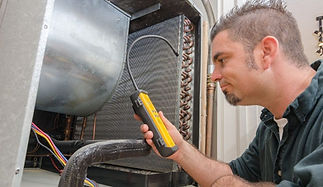 Man repairing air conditioner