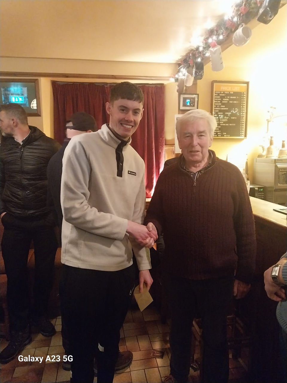 Martin Foley presenting David Hegarty with his prize