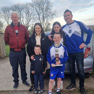Winner of Ted Hegarty's U-8 Tournament at The Phale Road with Family
