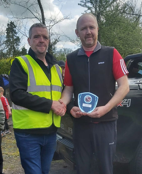 Olan Noonan Chairman North Cork Region presents the runner-up prize to Tim Young