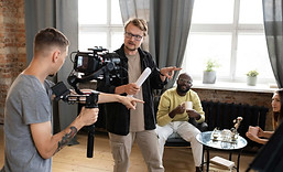 man-filming-with-professional-camera-new-movie.jpg