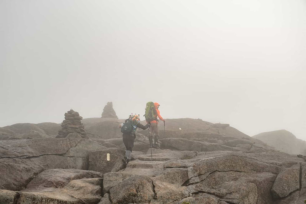 A couple hikes up Cascade Mountain for their elopement int he Adirondacks.