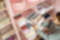 Woman organising jumpers in wardrobe.jpg