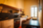 Cuisine moderne et coin repas dans Renaissance Appartement De Luxe
