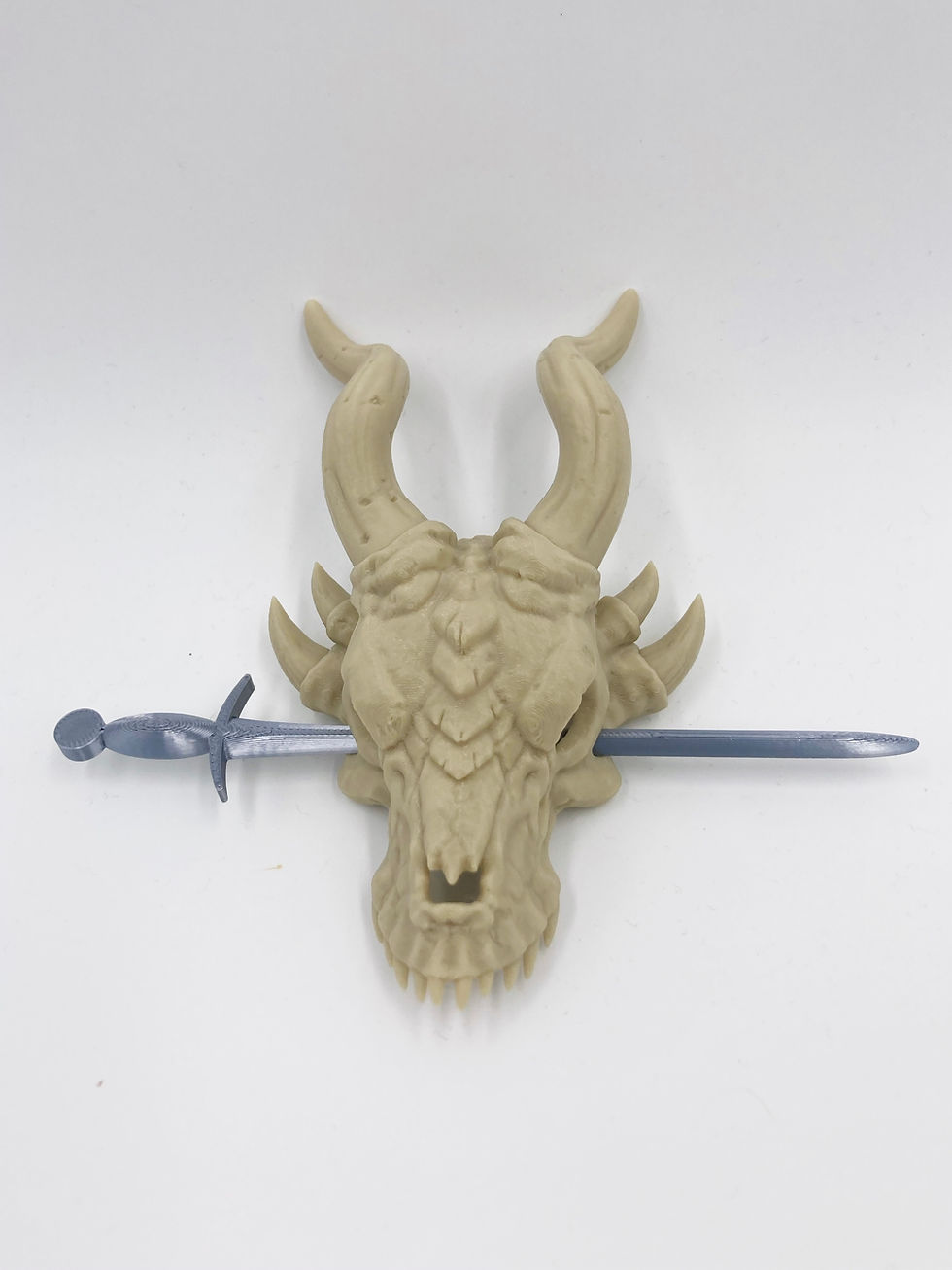 Thumbnail: dragon skull hair pin with sword pin