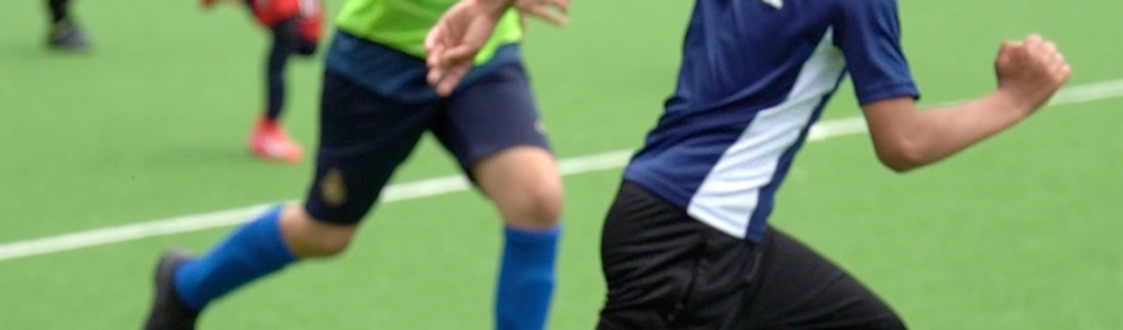 Young NexAim players competing in a small-sided game, showcasing teamwork and focus.