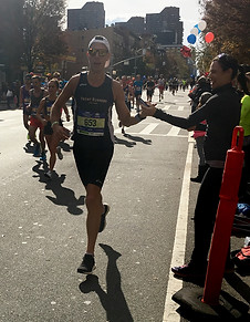 Claire Shorenstein supporting her nutrition client during the NYC marathon